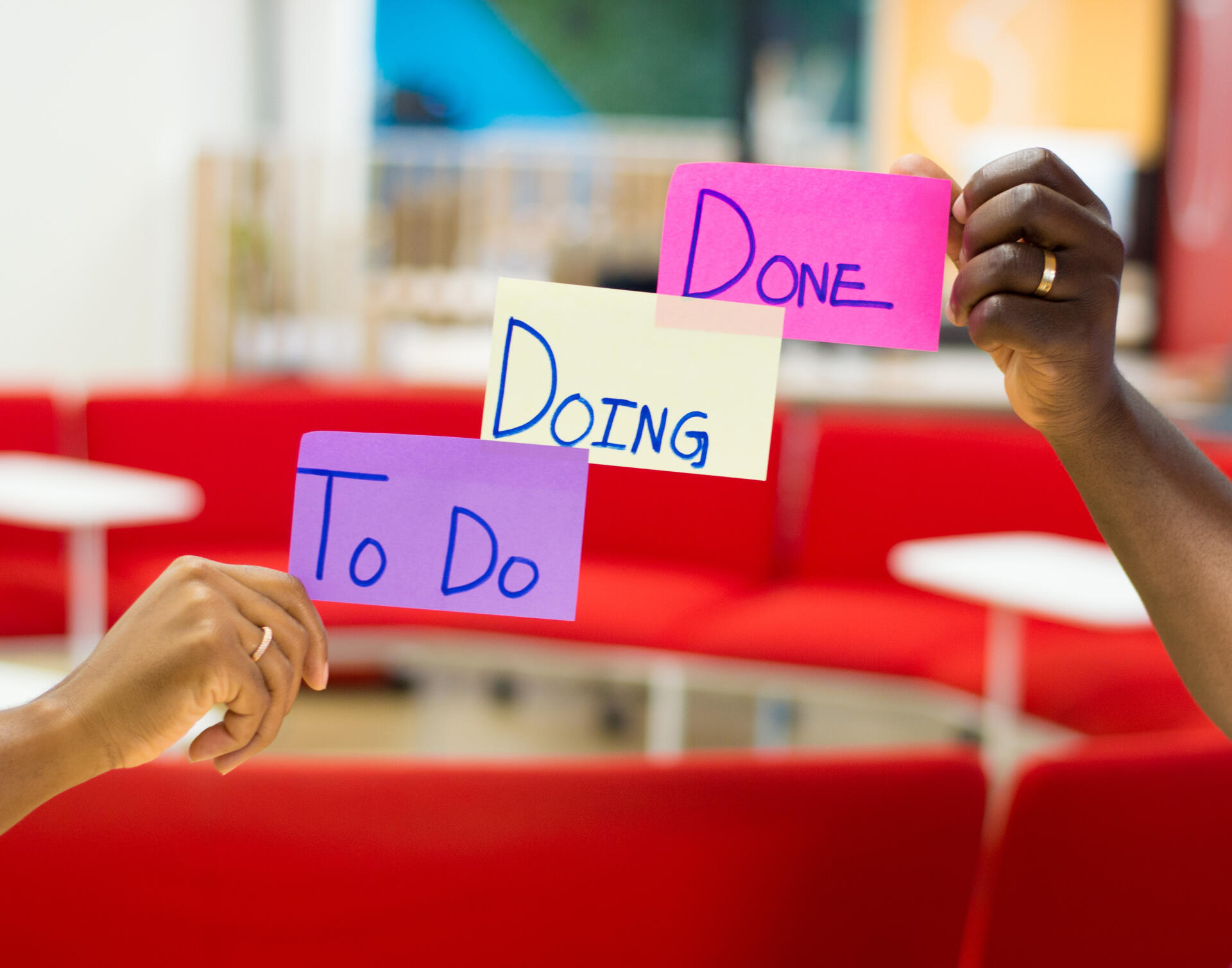 to do, doing and done labeled sticky notes.